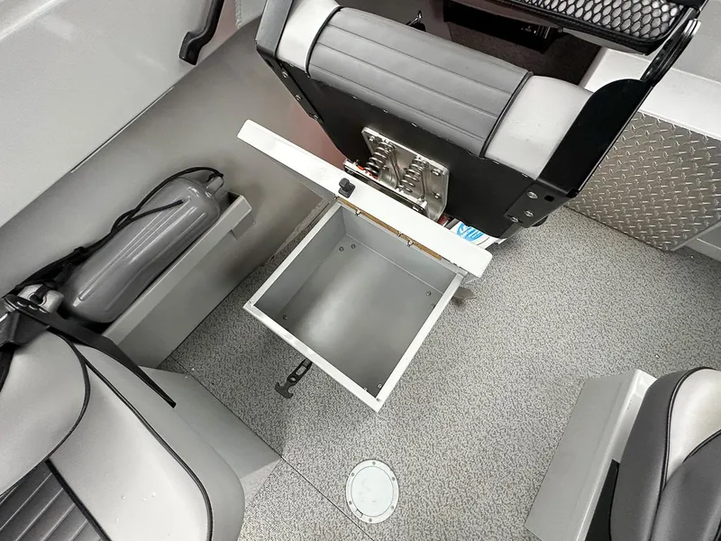 Slide: The Image of 2017 Hewescraft 160 Sportsman interior with open storage compartment and seating. - 12