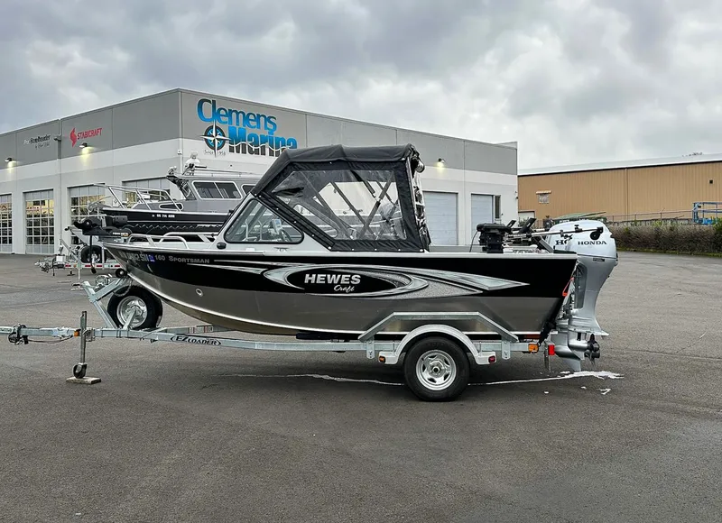 Slide: The Image of 2017 Hewescraft 160 Sportsman boat on trailer at Clemens Marina. - 3