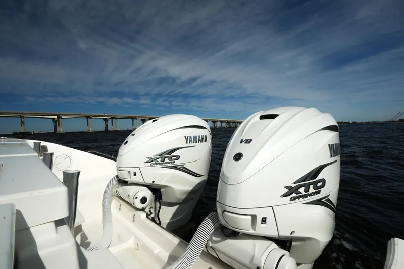 Slide: The Image of 2023 Pursuit OS 355 Offshore with Yamaha XTO engines on open water. - 24