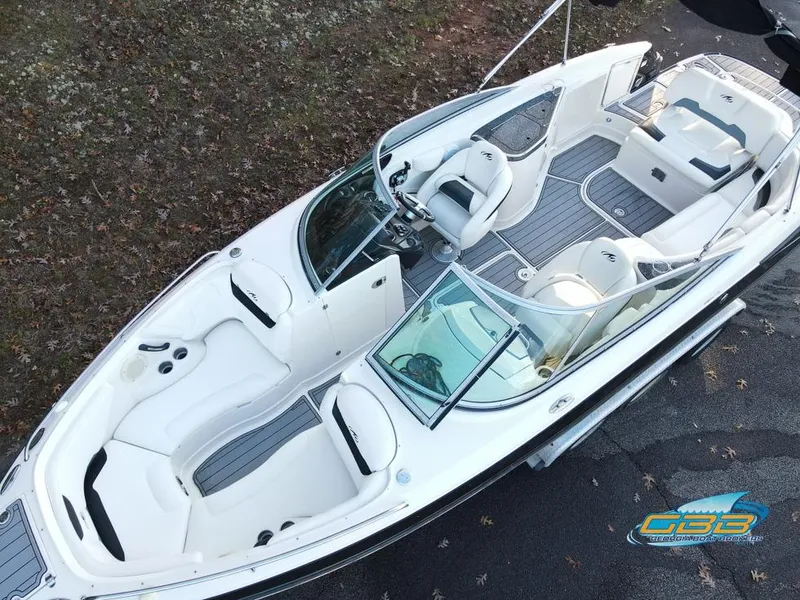 The Image of 2013 Monterey 264FS boat, aerial view, white interior, sleek design, spacious seating. - 0