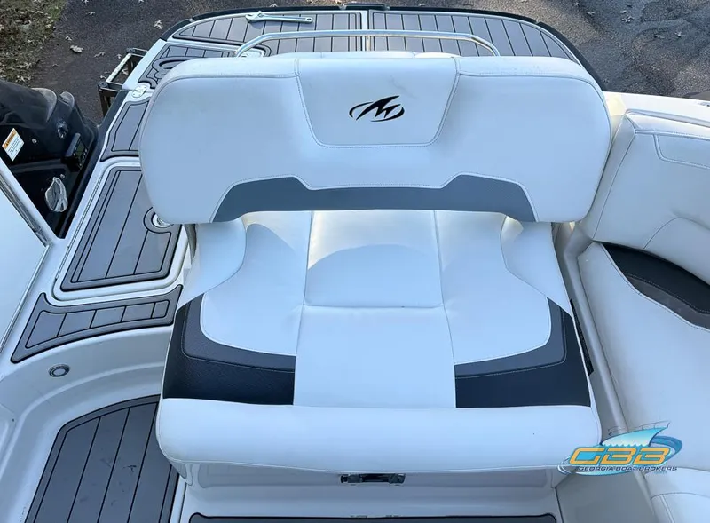 Slide: The Image of 2013 Monterey 264FS boat seat with white and black upholstery. - 19