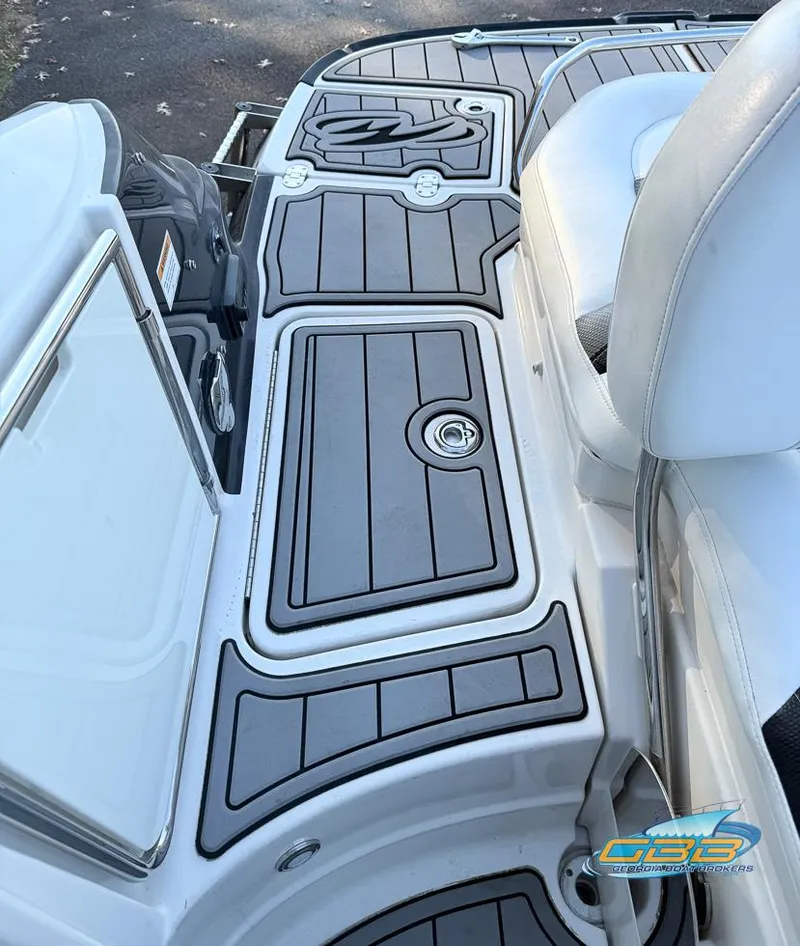 Slide: The Image of 2013 Monterey 264FS boat deck with custom non-slip flooring. - 29