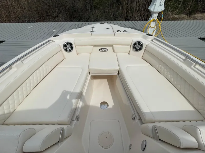 Slide: The Image of 2025 Grady-White Freedom 285 boat interior with spacious seating and modern design. - 13
