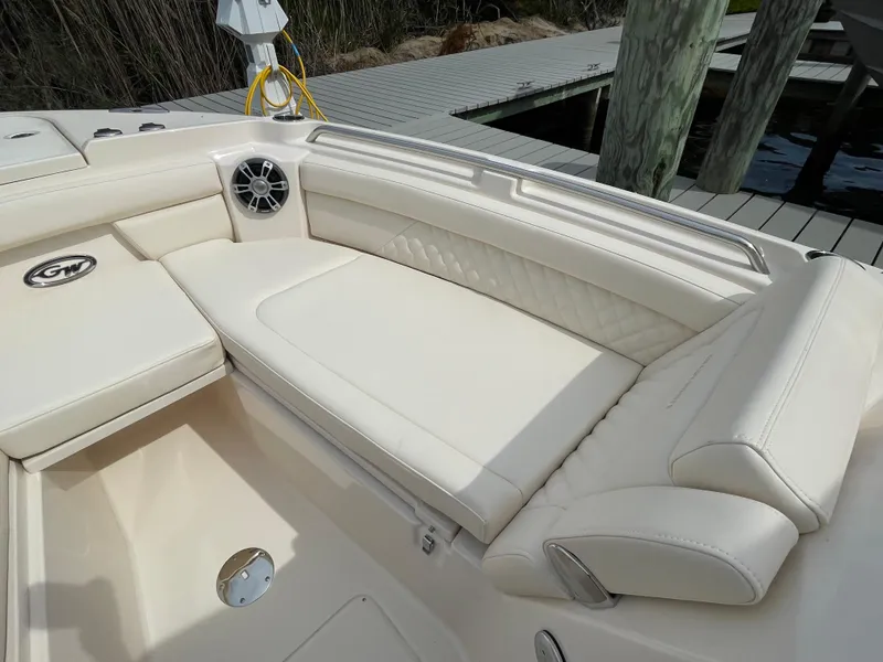 Slide: The Image of 2025 Grady-White Freedom 285 boat with luxurious cream seating and speaker system. - 15