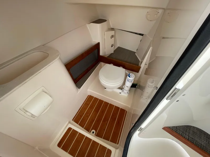Slide: The Image of 2025 Grady-White Freedom 285 boat interior with modern bathroom amenities. - 21