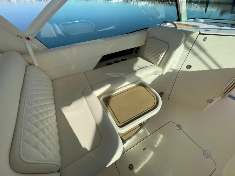 Slide: The Image of Luxurious interior of 2025 Grady-White Freedom 345 boat with quilted seating. - 36