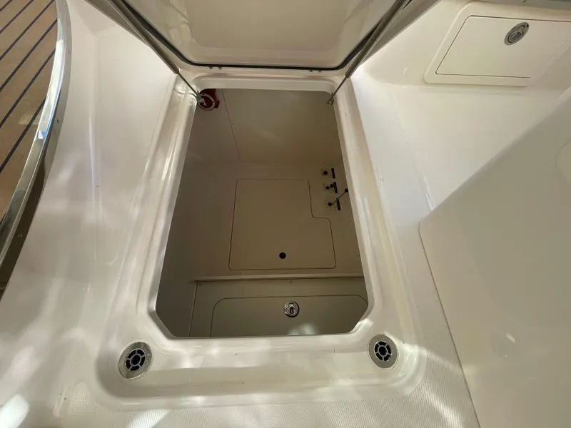 Slide: The Image of Storage compartment on 2025 Grady-White Freedom 345 boat, open and empty. - 39
