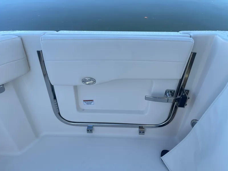 Slide: The Image of Grady-White Freedom 345 boat door, 2025 model, with sleek design and chrome accents. - 49
