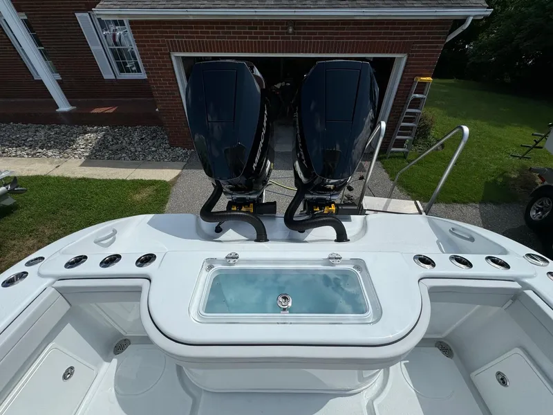 Slide: The Image of 2025 Yellowfin 32 Offshore boat with dual engines and spacious deck. - 34