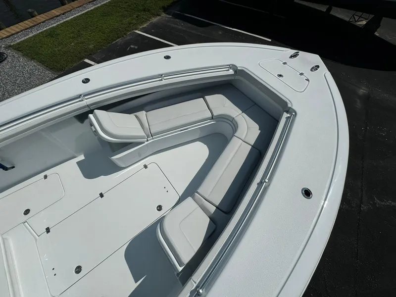 Slide: The Image of 2025 Yellowfin 34 Offshore boat with spacious seating and sleek design. - 13
