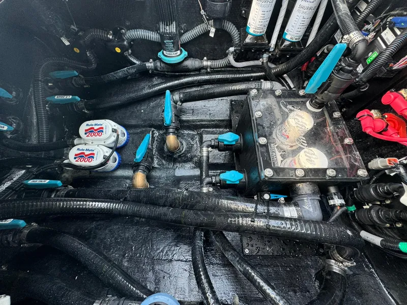 Slide: The Image of Engine room of 2025 Yellowfin 34 Offshore boat with wiring and components. - 30