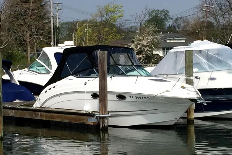 The Image of 2017 Chaparral 270 Signature boat docked in marina. - 0