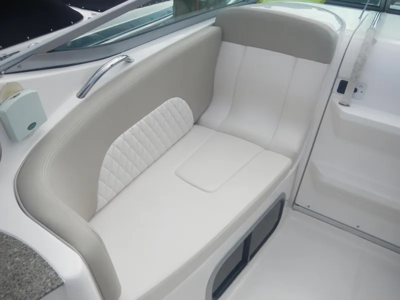 Slide: The Image of 2017 Chaparral 270 Signature boat interior with white leather seating. - 14