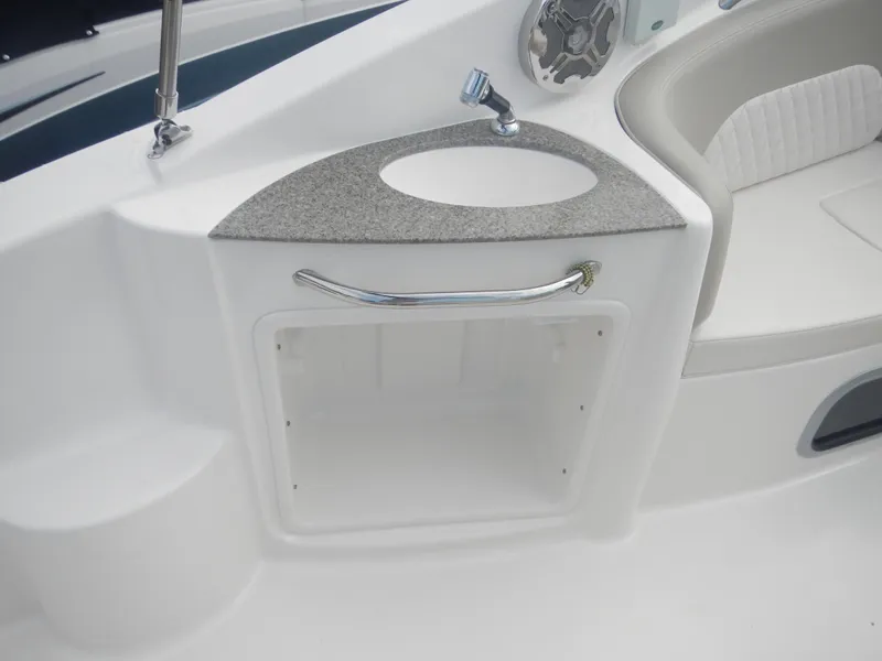 Slide: The Image of 2017 Chaparral 270 Signature boat interior with sink and seating area. - 15