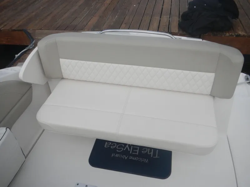 Slide: The Image of 2017 Chaparral 270 Signature boat seat with quilted design, dockside view. - 17