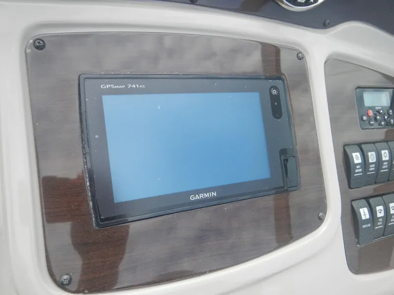 Slide: The Image of Garmin GPS display on 2017 Chaparral 270 Signature boat dashboard. - 26