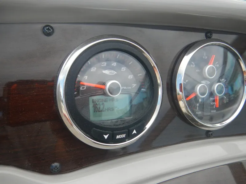 Slide: The Image of Dashboard gauges of 2017 Chaparral 270 Signature boat showing engine hours. - 27