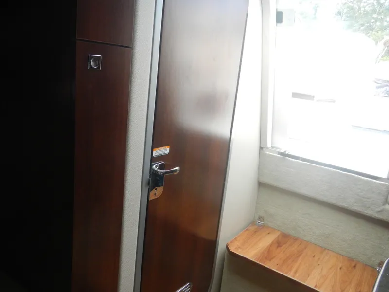 Slide: The Image of Interior cabin door of 2017 Chaparral 270 Signature boat. - 34