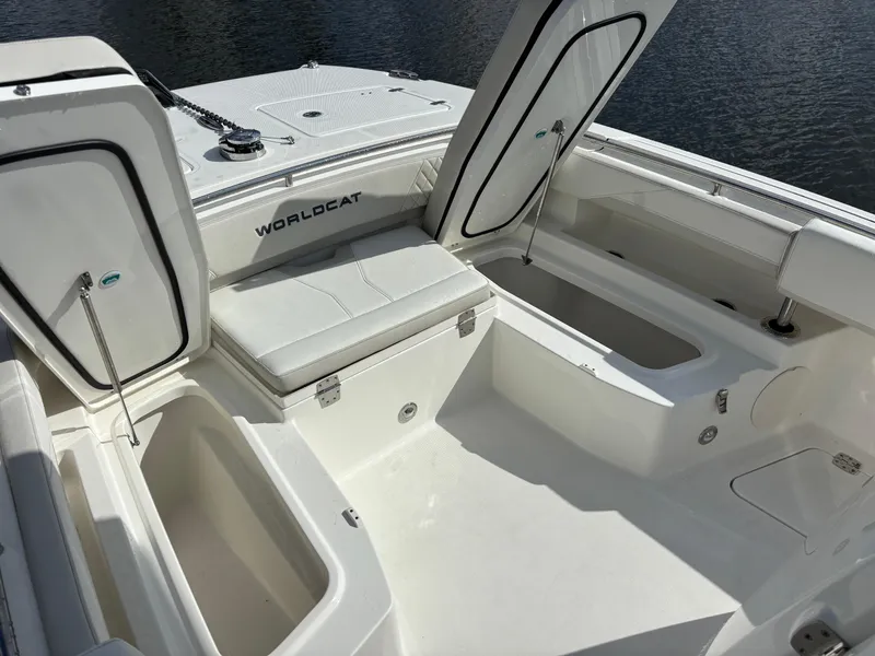 Slide: The Image of 2025 World Cat 260 CC-X boat interior with open storage compartments. - 20