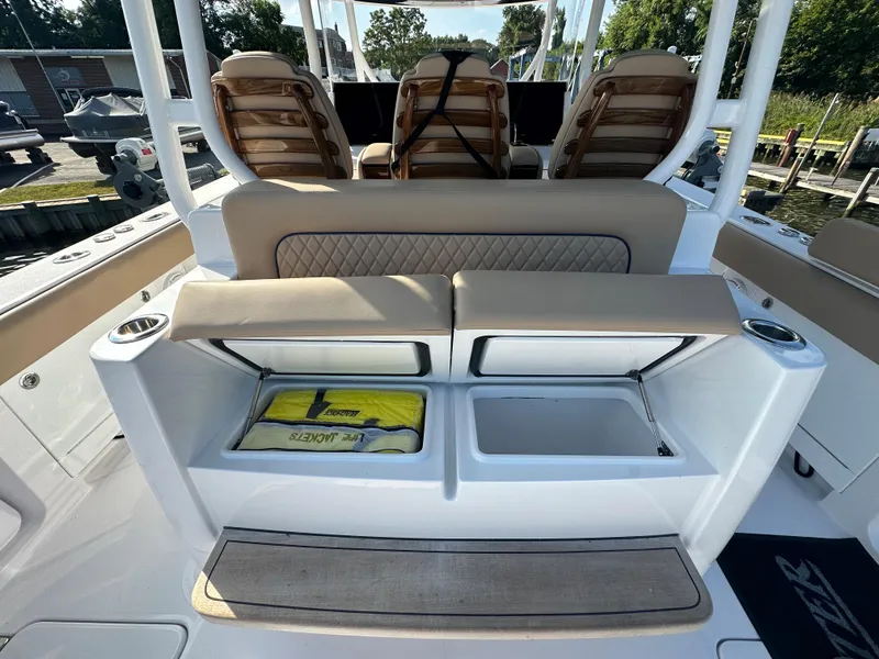 Slide: The Image of 2024 Jupiter 43 boat interior with seating and storage compartments. - 13
