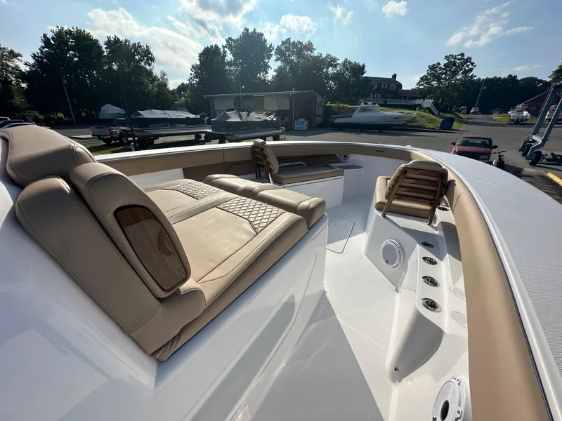 Slide: The Image of Luxurious 2024 Jupiter 43 boat with tan seating and sleek design. - 46