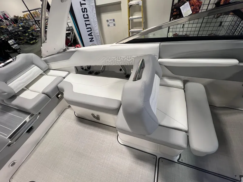 Slide: The Image of 2025 Regal LS4 boat interior with sleek white seating and modern design. - 13