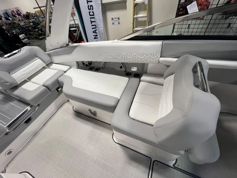 Slide: The Image of 2025 Regal LS4 boat interior with sleek, modern seating and elegant design. - 14