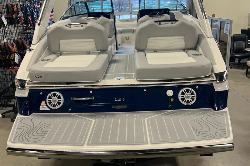 Slide: The Image of 2025 Regal LS4 boat with dual seating and modern design. - 17