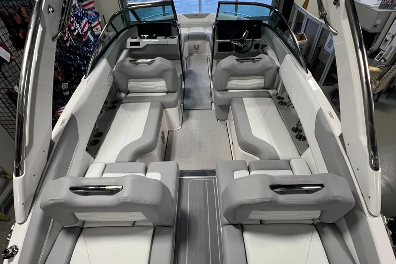 Slide: The Image of 2025 Regal LS4 boat interior with luxurious seating and modern design. - 18