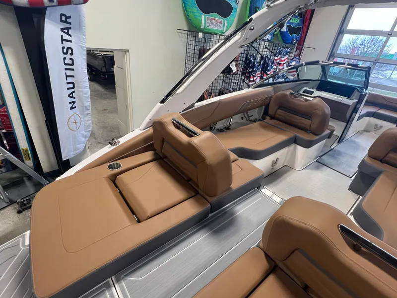 Slide: The Image of 2025 Regal LS4 boat interior with tan seating and modern design. - 3