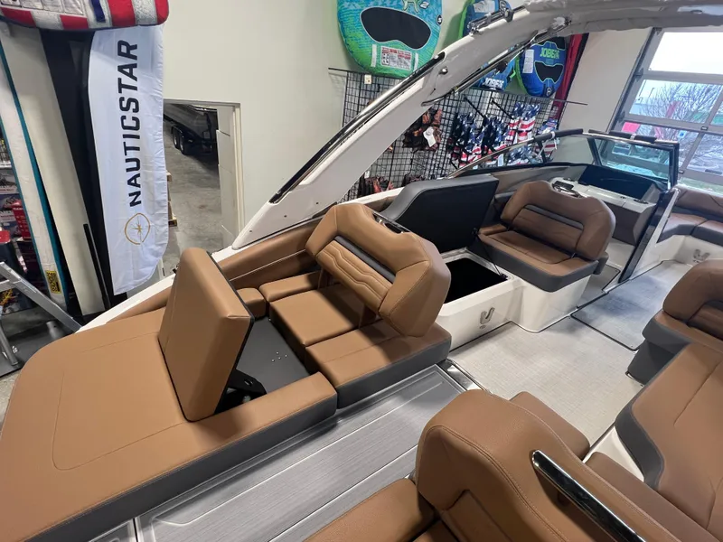 Slide: The Image of 2025 Regal LS4 boat interior with tan seating and modern design. - 4