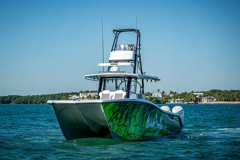 Slide: The Image of Interior view of a 2024 Costa Custom Boats 34 on the water. - 35