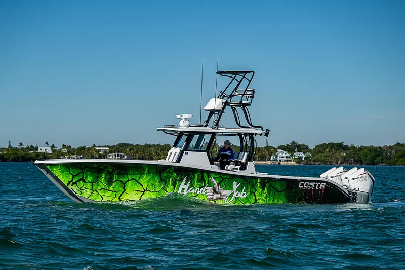 Slide: The Image of Costa Custom Boats 34, 2024, open storage compartment on deck. - 38