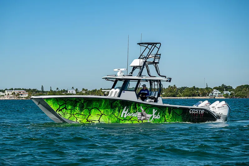 Slide: The Image of Costa Custom Boats 34, 2024, on open water. - 39