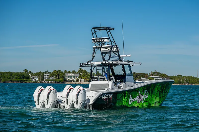 Slide: The Image of Costa Custom Boats 34, 2024 model, luxurious deck on open sea. - 45