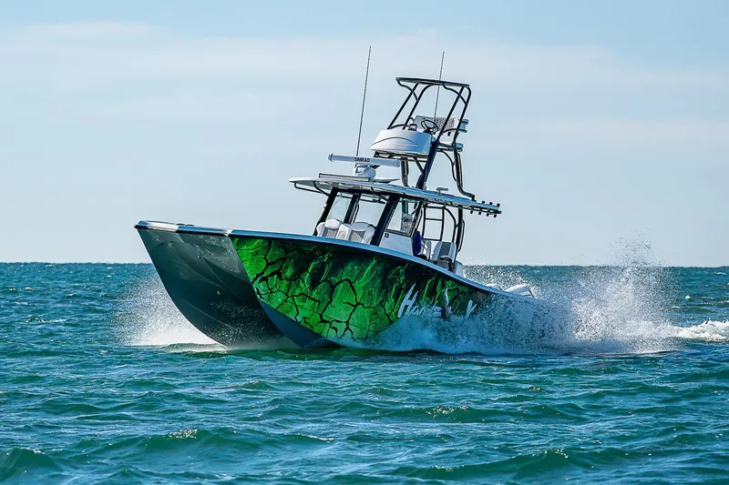 Slide: The Image of Helm of 2024 Costa Custom Boats 34 on open sea. - 5