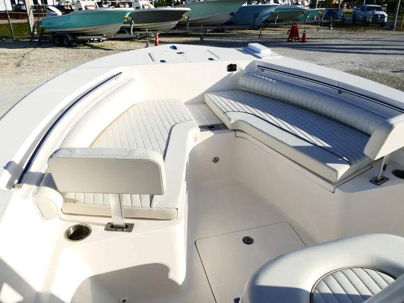 Slide: The Image of 2019 Sea Born LX22 Center Console boat with spacious seating area. - 21
