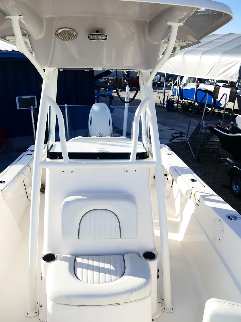 Slide: The Image of 2019 Sea Born LX22 Center Console boat with T-top and seating. - 27