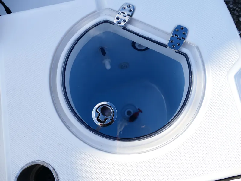 Slide: The Image of 2019 Sea Born LX22 Center Console livewell with clear lid and stainless steel hinges. - 33
