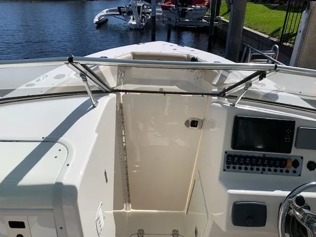 Slide: The Image of 2018 Key West 239 DFS boat interior with control panel and water view. - 14