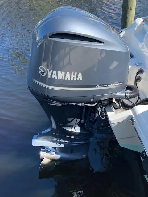 Slide: The Image of Yamaha outboard motor on 2018 Key West 239 DFS boat in water. - 4