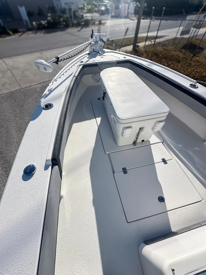 Slide: The Image of 2021 Dorado 25 FD boat deck with storage and seating. - 10