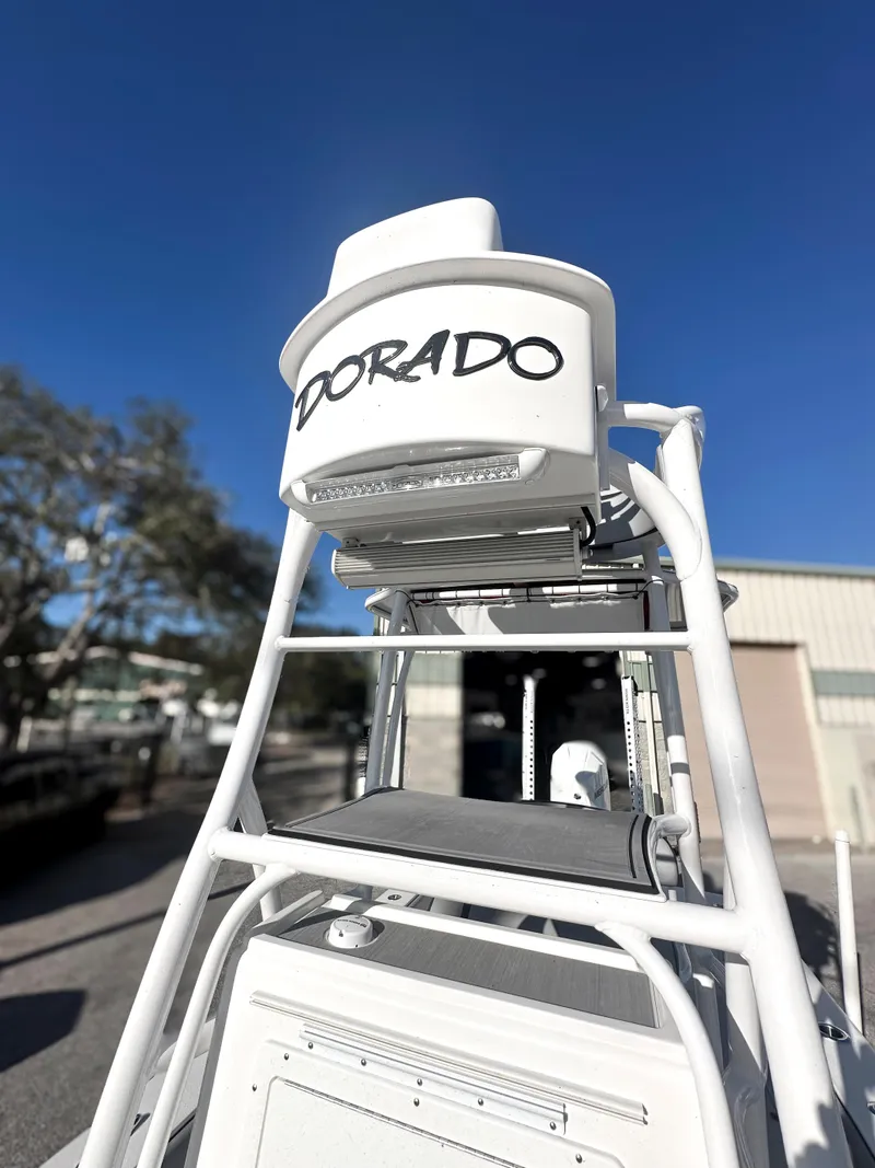 Slide: The Image of 2021 Dorado 25 FD boat tower against clear blue sky. - 13