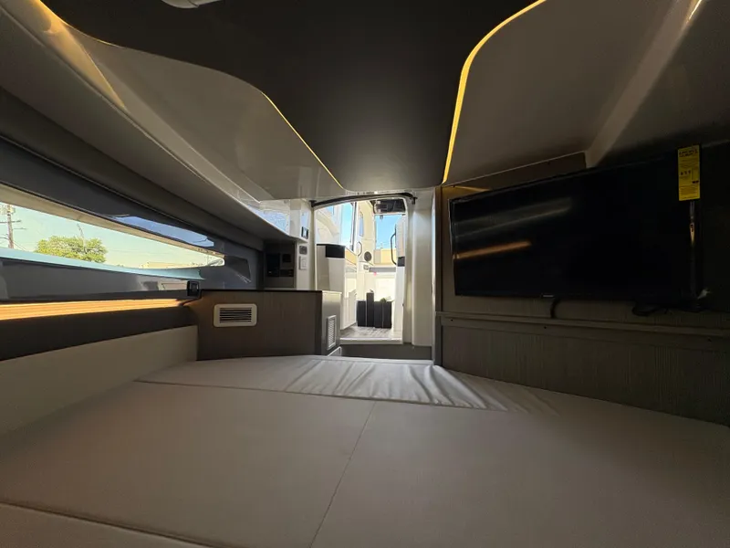 Slide: The Image of Interior of 2025 Navan C30 boat with modern design and cozy seating area. - 20