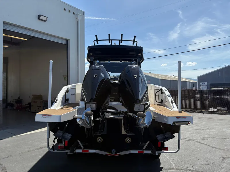 Slide: The Image of Rear view of 2025 Navan C30 boat with dual engines at a dock. - 5