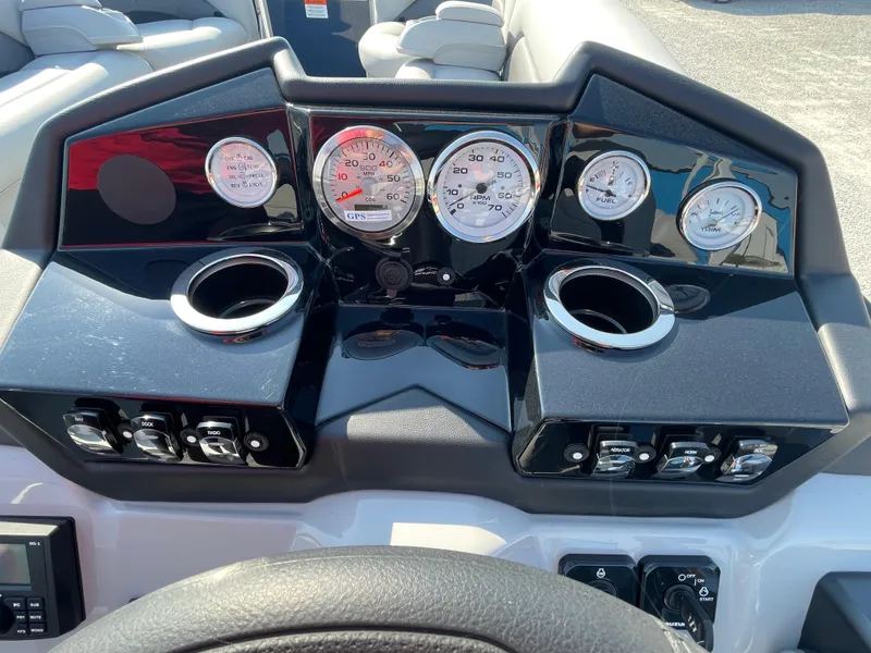 Slide: The Image of Dashboard of 2025 Landau Island Breeze 25 with gauges and controls. - 14