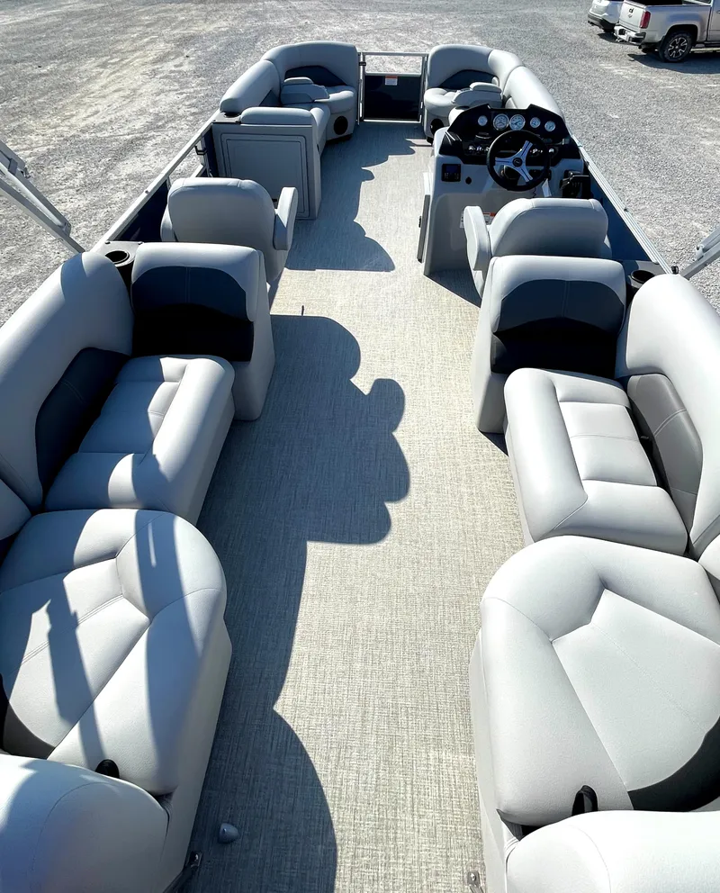 Slide: The Image of 2025 Landau Island Breeze 25 pontoon boat with spacious seating and 225HP Suzuki engine. - 17