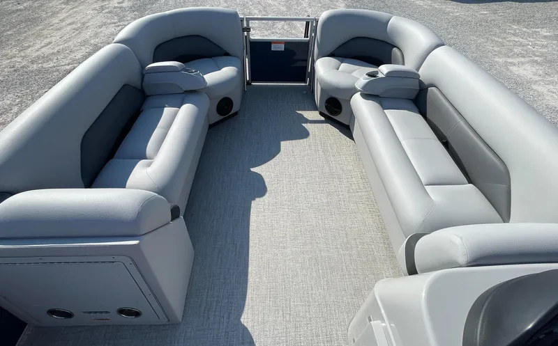 Slide: The Image of 2025 Landau Island Breeze 25 pontoon boat interior with plush gray seating. - 6