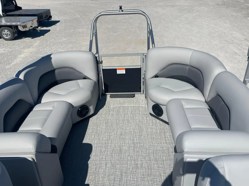 Slide: The Image of 2025 Landau Island Breeze 25 pontoon boat with spacious seating and modern design. - 13