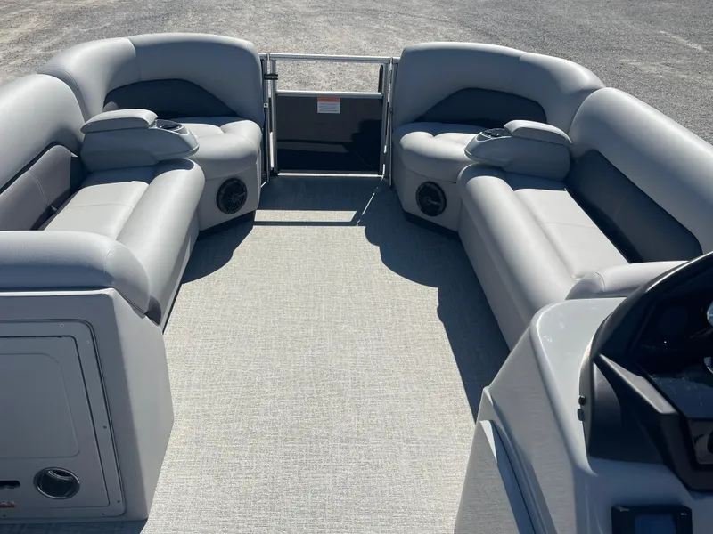 Slide: The Image of 2025 Landau Island Breeze 25 pontoon boat interior with spacious seating and modern design. - 6